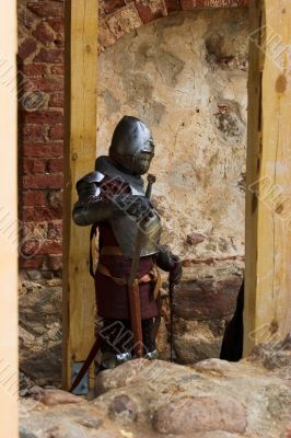 Armoured knight with swords