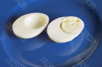Egg on blue plate
