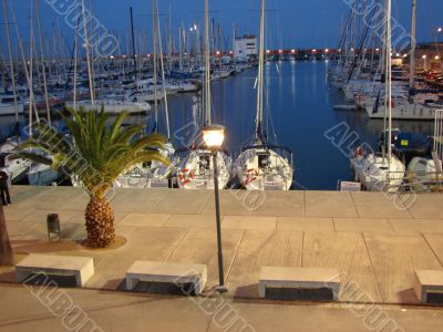 Night panorama of Barcelonian port. Port Olimpic