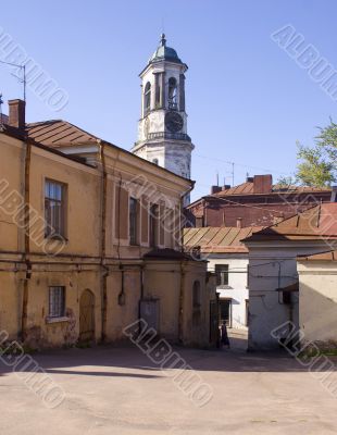 Old city court yard with a kind on a tower