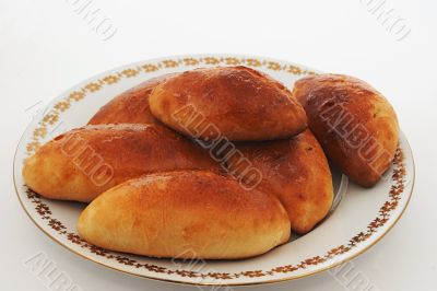 Ruddy pies on a white background