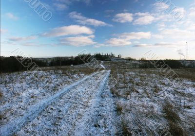 Field road to hills