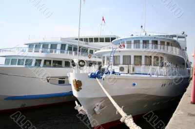 Two passenger motorships docked