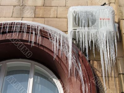 Icicles on the conditioner in frosty day