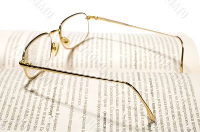Book ok white with glasses