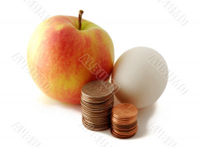 Red green apple and egg with coins