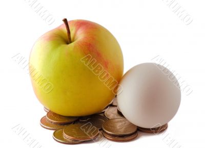 Red green apple and egg with coins