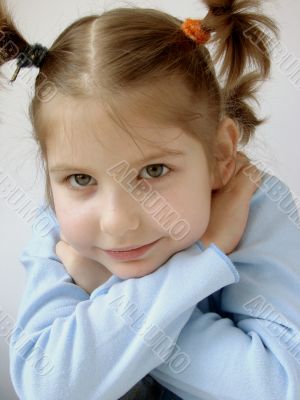 smiling girl in blue