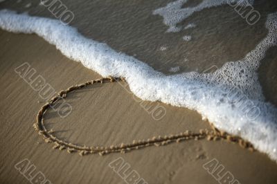 Heart on sand