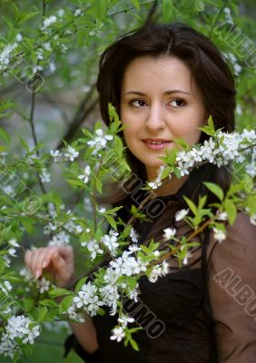 Portrait in a cherry garden