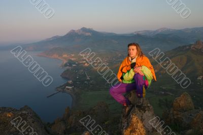 Girl looking on sunrise