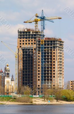 Cranes and building