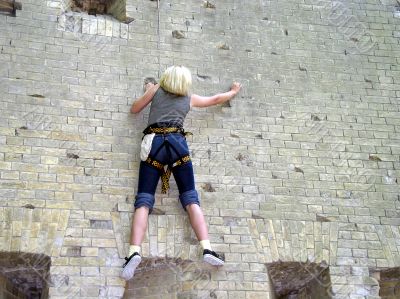 Hard brick wall and girl