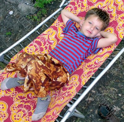 The boy lying