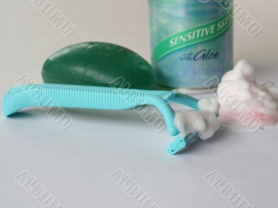 Razor with soap and cream