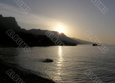 Sunrise on the sea beach in Crimea
