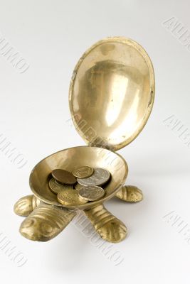 Bronze turtle with coins