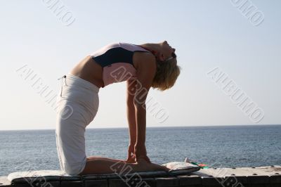 Nice women Yoga on the beach