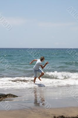 girl goes from the waves