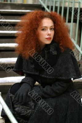 Portrait of the girl with red hair