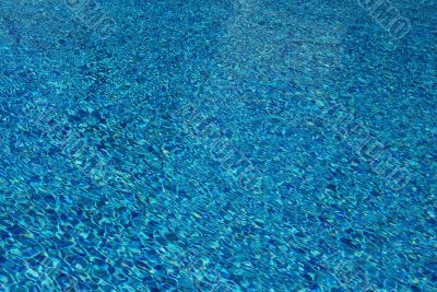 Blue water on a surface of pool