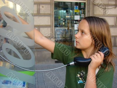 The girl calling by city phone