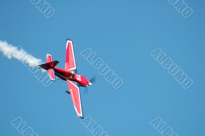 Smoke Airplane in blue sky