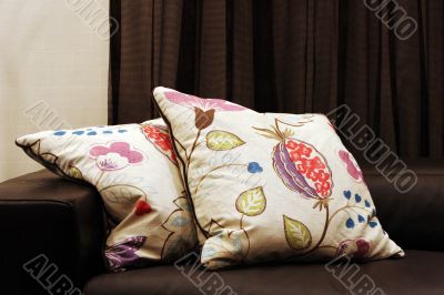 Modern sofa with patterned cushions