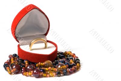 Gold ring in a red velvet box