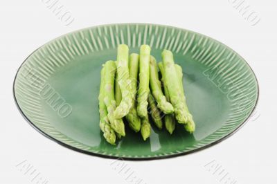 Fresh asparagus shoots on a plate