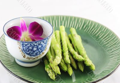 Fresh asparagus shoots on a plate