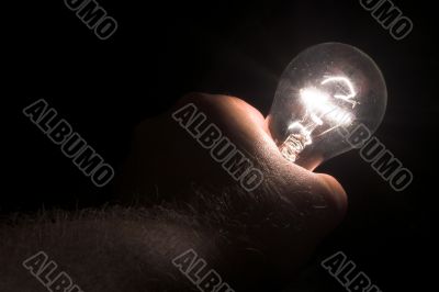 Holding a Light Bulb