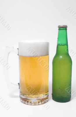 A glass mug of ice cold beer.