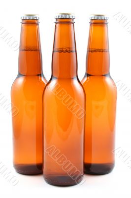 three bottles of beer isolated on white