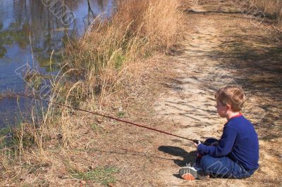little boy fishing