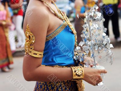 Thai female in bright traditional dress