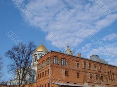 Cathedral red brick wall under deep blue sky