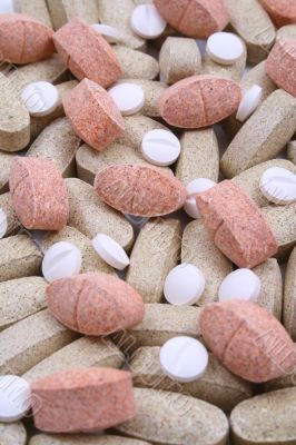background of various pills isolated on white