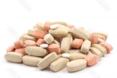 pile of various pills isolated on white
