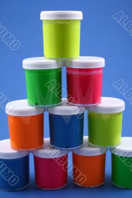 colorful paints close-ups blue background