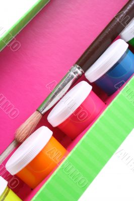 box of colorful paints close-ups
