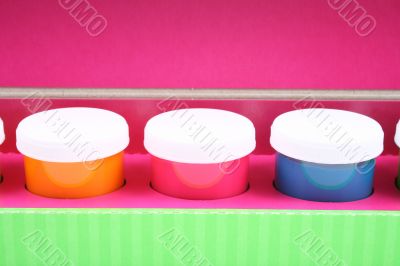 box of colorful paints close-ups