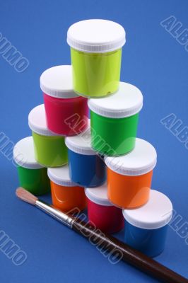 colorful paints close-ups blue background