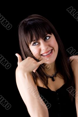 Brunette with brackets on teeth calling