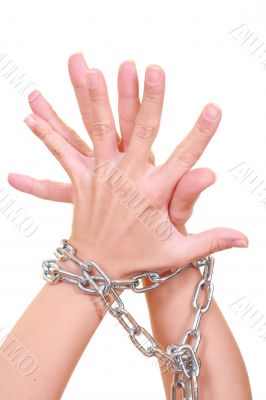 two hands with chain isolated on white