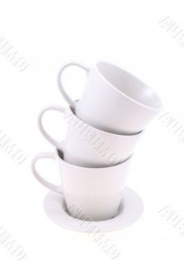 stack of three white cups isolated