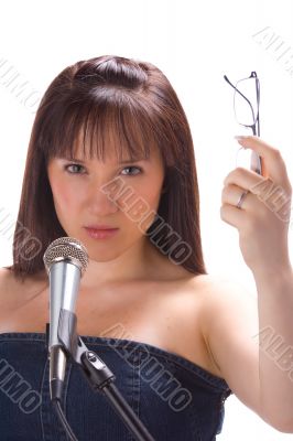 Girl with mic and glasses