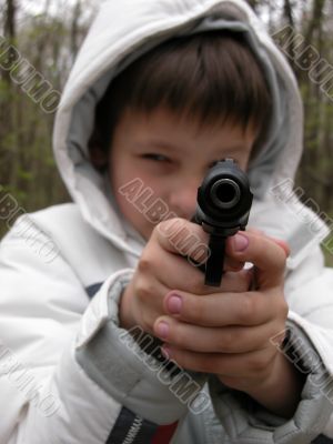 Boy with pistol