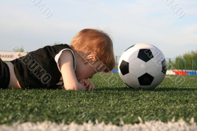 The boy and a ball.