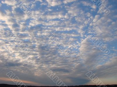 Cloudy sunset sky wide angle view